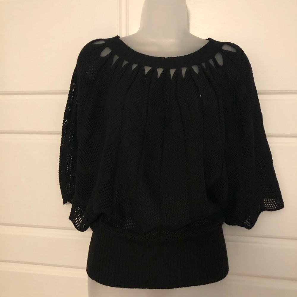 The Cue Cher Cu knit top